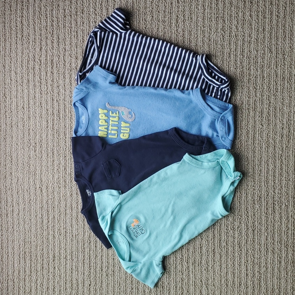 Carter's set of 4 onesies, size 9 months